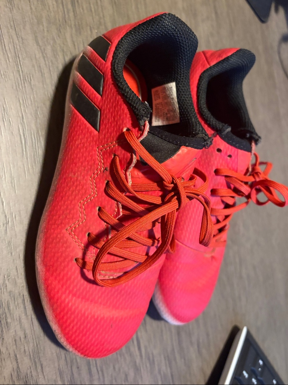 Adidas’s Kids Bright Red Soccer Cleats with Black Accents